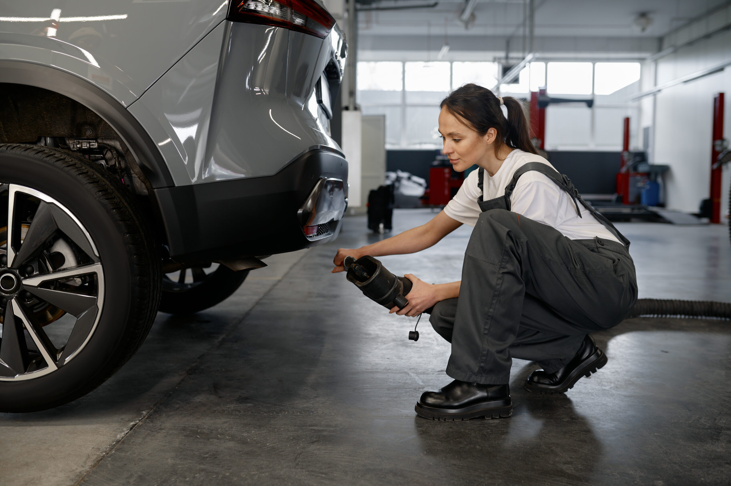 Woman testing a car emission